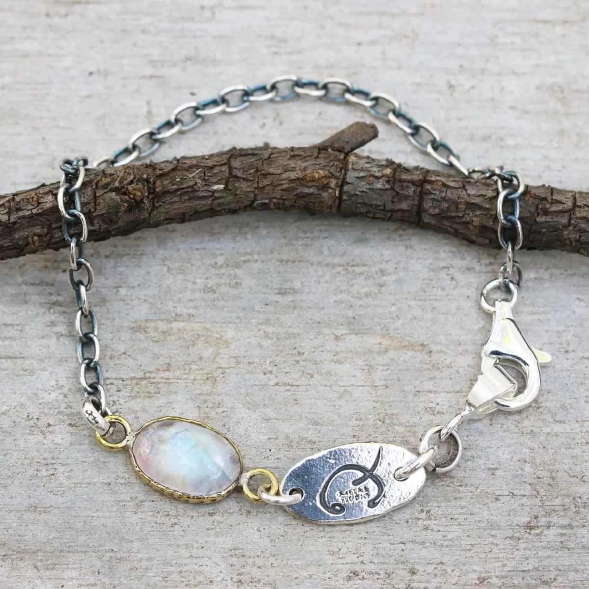 Bracelet oval cabochon moonstone in brass bezel setting and oxidized sterling silver chain